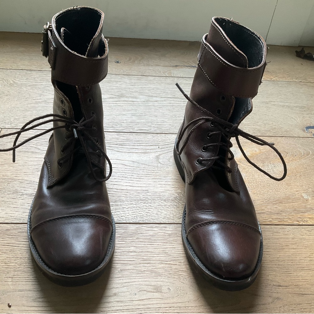 Dolce & Gabbana (D&G) brown lace-up boots.